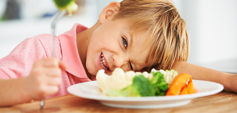 Boy With Vegetables